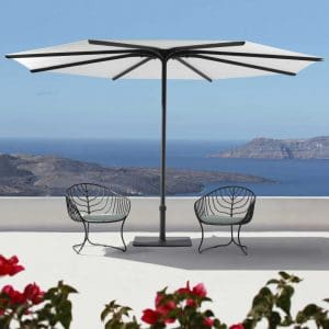 Image of black Folia easy chairs and black and white Oazz parasol by Royal Botania