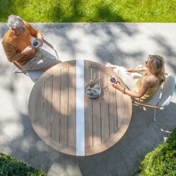 Birdseye view of Royal Botania Traverse round folding garden table on terrace