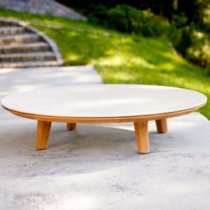 Image of Aspect 1.4 metre diametre table with teak legs and travertine ceramic top by Cane-line
