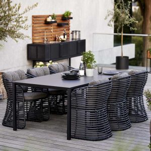 Image of Basket black cane garden chairs and Pure rectangular ceramic table by Cane-line