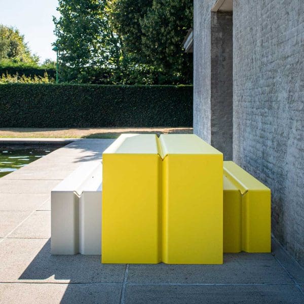 Image of Wünder's The Bended yellow garden table and grey and yellow bench seats