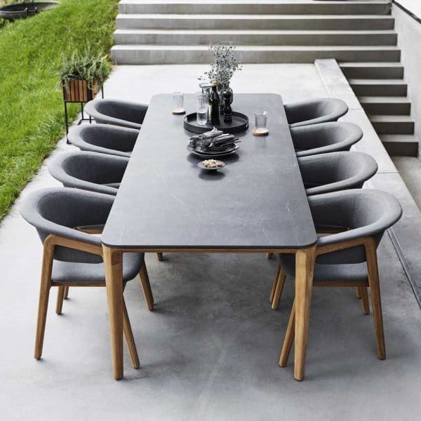 Image of Aspect teak & ceramic garden table with Luna chairs by Cane-line