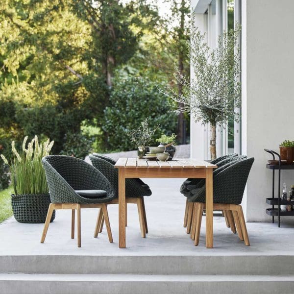 Image of Peacock garden tub chairs and Grace teak table by Cane-line