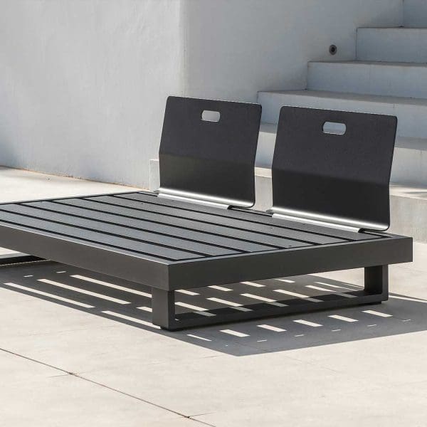 Image of Fano outdoor lounge module without cushions, showing the furniture's charcoal coloured base and backs