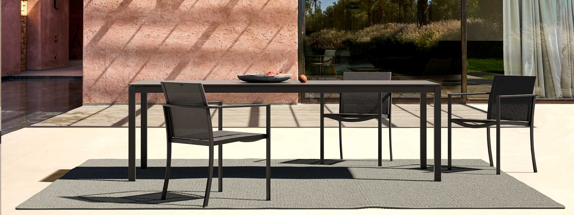 Image of black Ozon garden chairs and Taboela dining table by Royal Botania