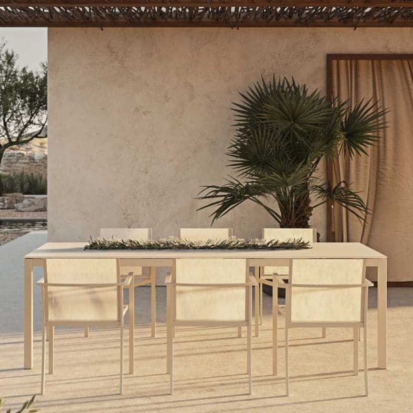 Image of OZN55T white outdoor chairs and Taboela white garden table by Royal Botania on terrace