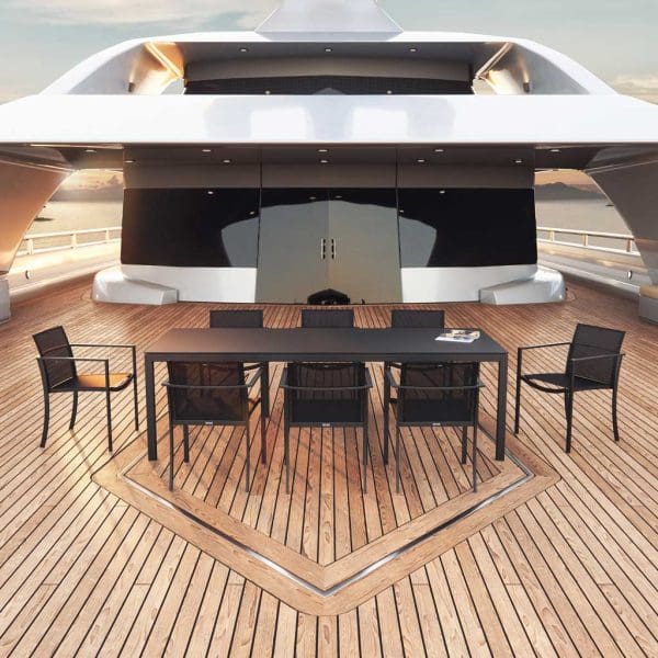 Image of Royal Botania Ozon chairs and Taboela table on aft deck of superyacht