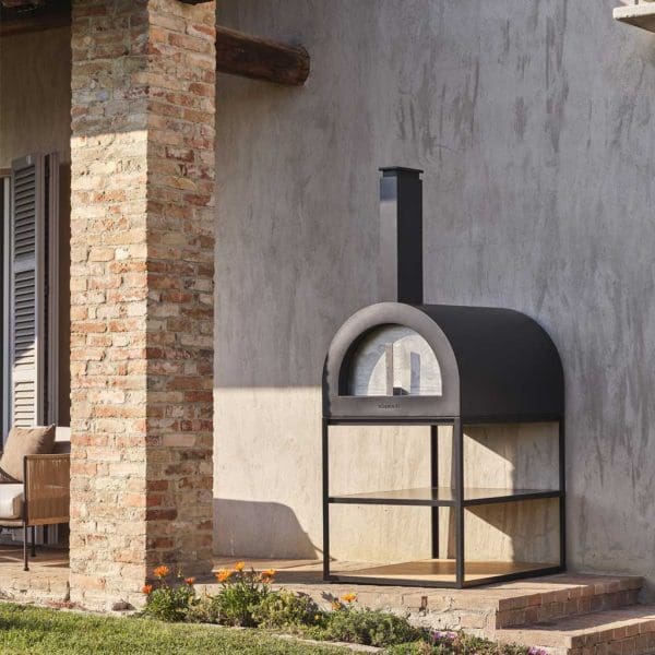 Image of anthracite coloured outdoor pizza oven with shelves below by Roshults, Sweden