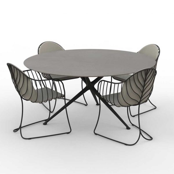 Studio image of Folia garden chairs and Exes circular dining table by Royal Botania