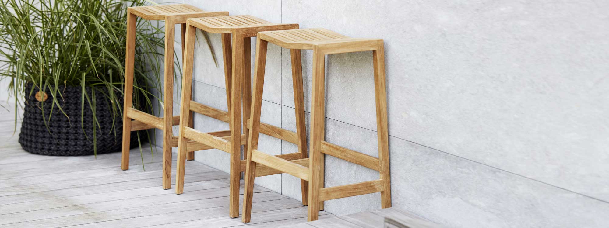 Image of 3 Flip teak bar stools in WWF certified hardwood by Caneline