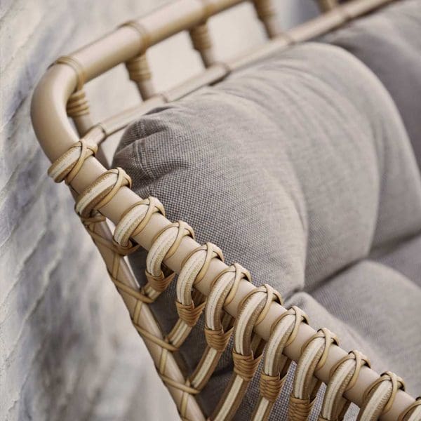 Image of detail of natural finish Cane-line Weave and Taupe AirTouch cushions used for Strington outdoor furniture
