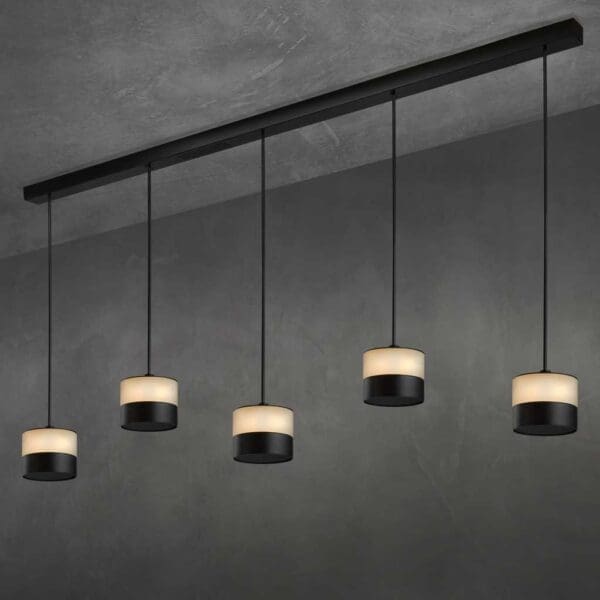 Image of row of 5 ceiling mounted Heatsail Glow heating and lighting pendants at different staggered heights