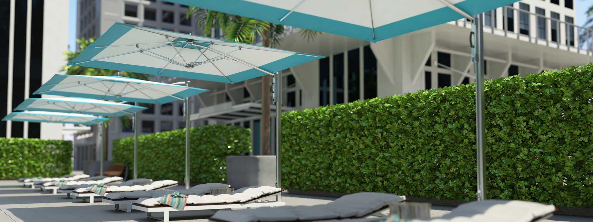 Image of row of Tuuci Ocean Master side mast parasols with contrasting color canopies over sun loungers on hotel poolside