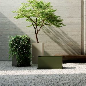 Image of various sizes and colours of OiPots linear planters sat in corresponding size of base tray