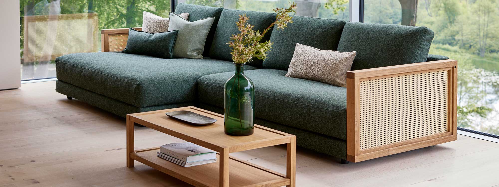 Image of Scale twin daybed and 2 seat sofa with Dark green Cane-line Zen, with arms in oak and French weave natural rattan