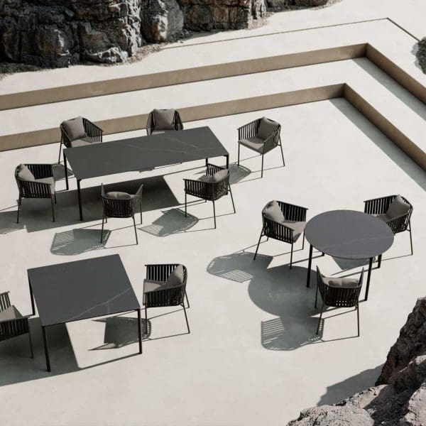 Image of aerial view of Oiside Twist luxury outdoor dining furniture on sunny outdoor terrace