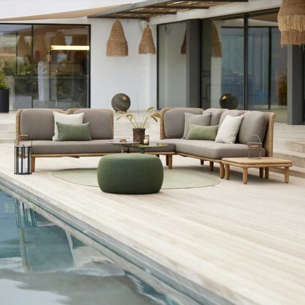 Image of Cane-line Arch modern rattan corner sofa and Circle pouf by Cane-line on alluring poolside