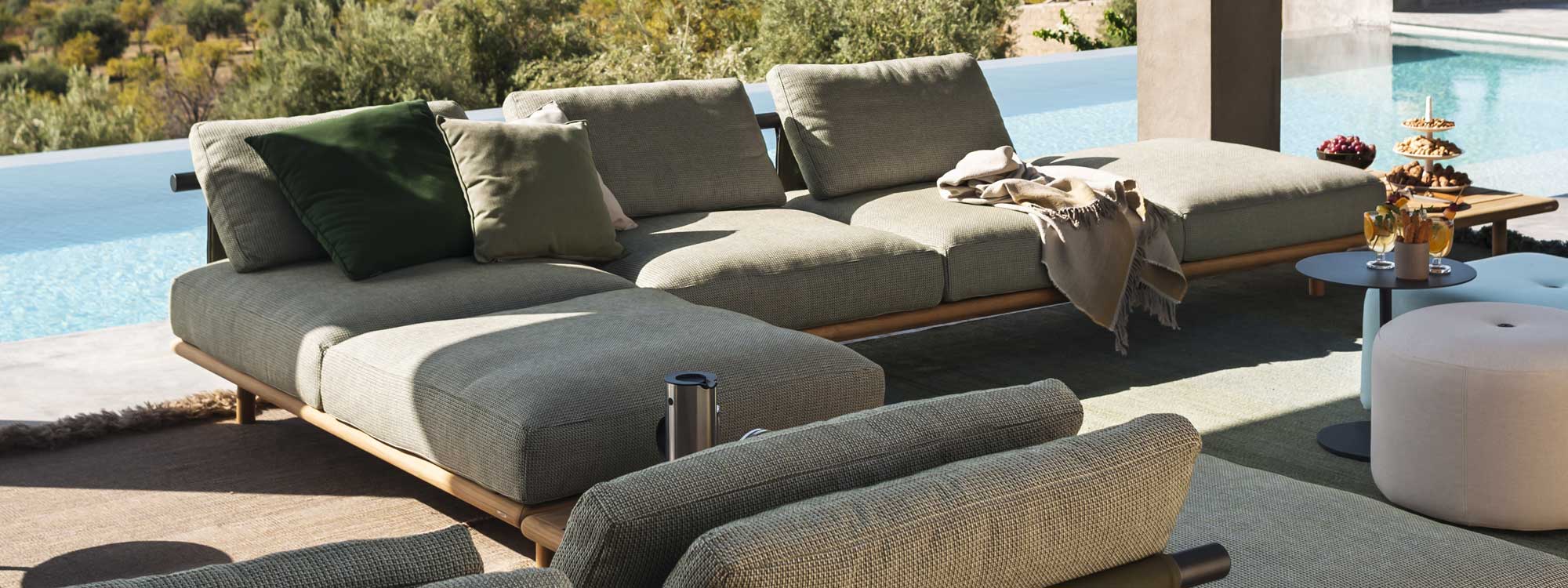 Image of Eden modern modular garden sofa by RODA in sun and shade of alluring poolside terrace