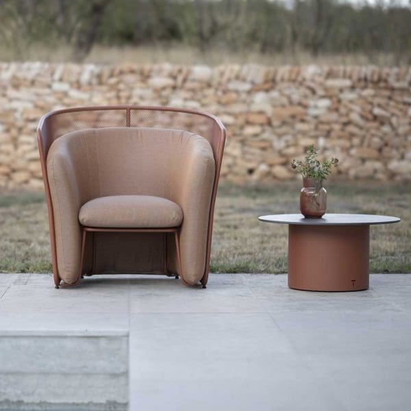 Image of copper-brown coloured Slide designer outdoor relax chair and Branta modern round low table by Todus