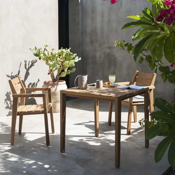 Image of Zania stacking garden chair and square dining table in FSC iroko by RODA