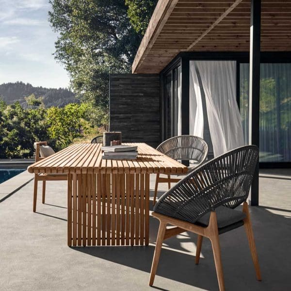 Image looking down the planked teak top of Deck linear garden table by Gloster