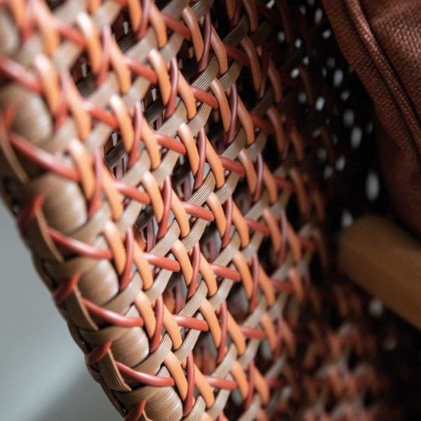 Image of detail of the all-weather French weave on the back of Kay garden lounge chair by Gloster