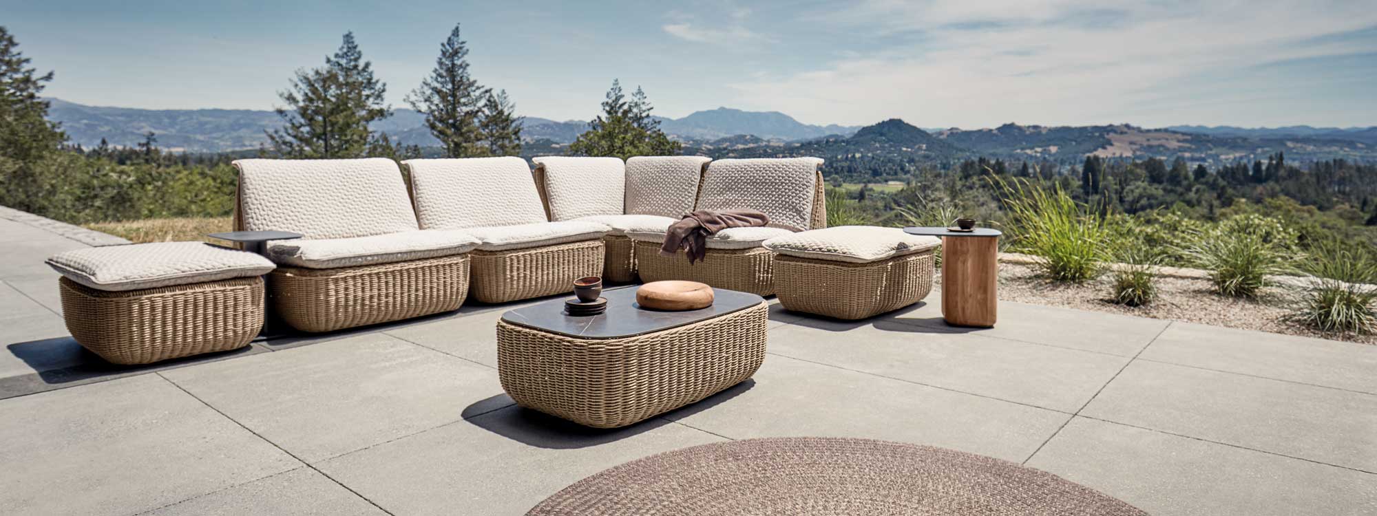 Image of Gloster Omada luxury rattan garden corner sofa