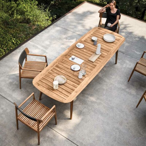 Image of birds eye view of Archi modern teak chairs and Gloster long teak table on terrace