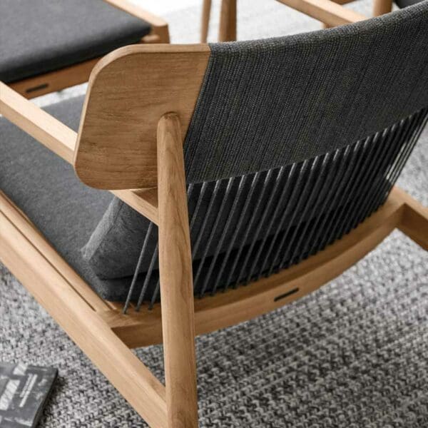 Image of detail of Raven-coloured all-weather rope back of Archi teak lounge chair by Gloster