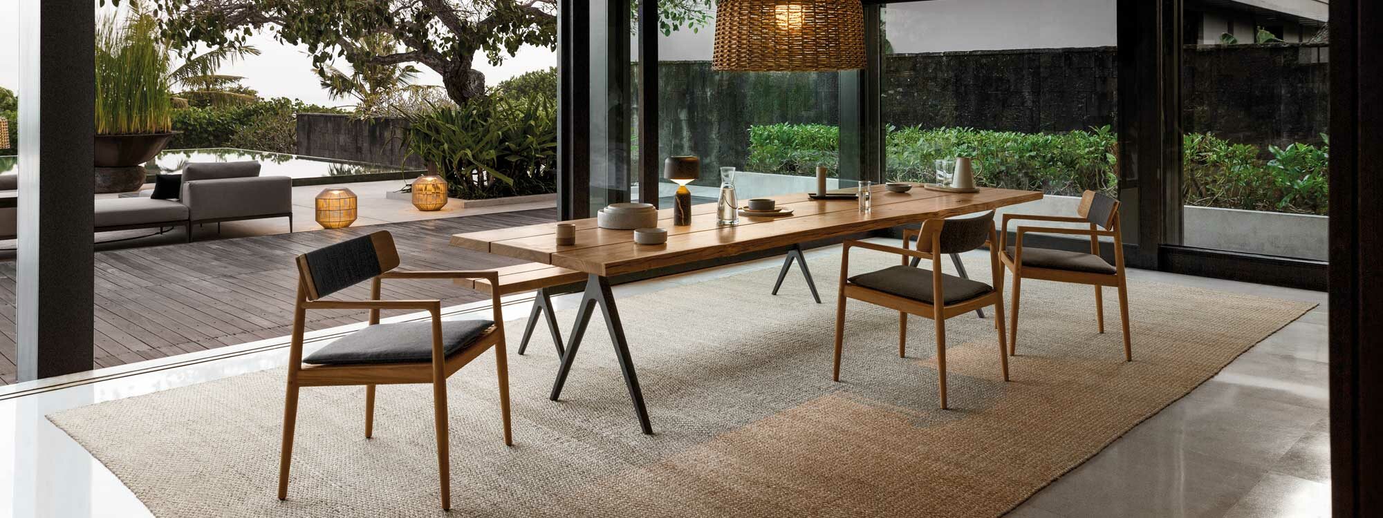 Image of Gloster Archi teak dining chairs and Raw long garden dining table