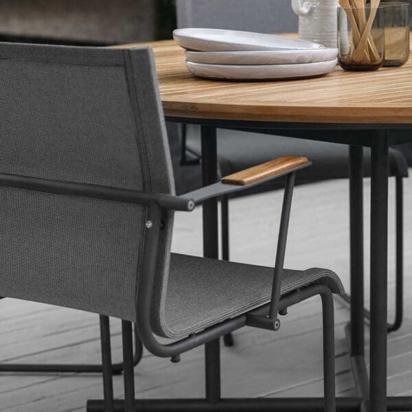 Image showing tubular stainless steel frame and Batyline mesh seat and back of Sway modern garden chair by Gloster