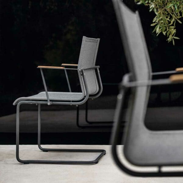 Image showing the profile of the cantilevered stainless steel frame and Batyline mesh seat and back of Sway chair by Gloster