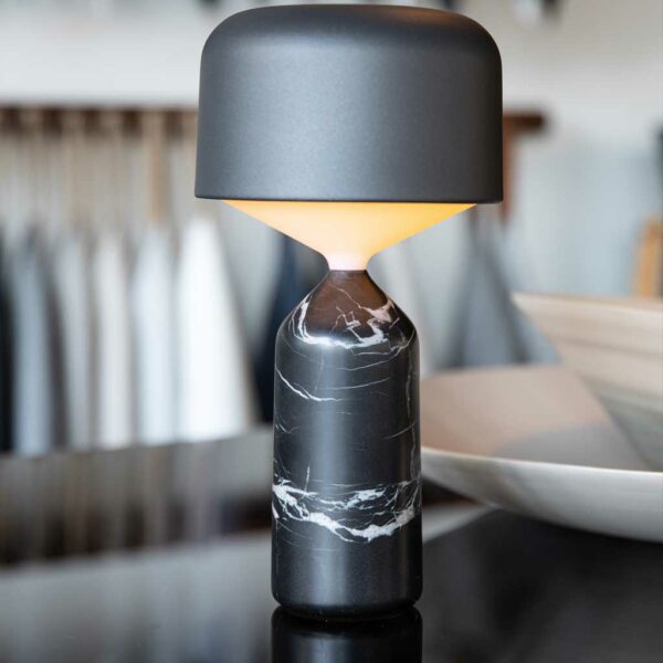 Image of carbon-coloured solid stone base of Pebble garden table lamp