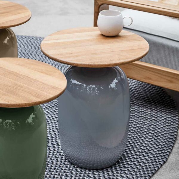 Image of 3 different colours of Blow glazed outdoor side tables by Gloster