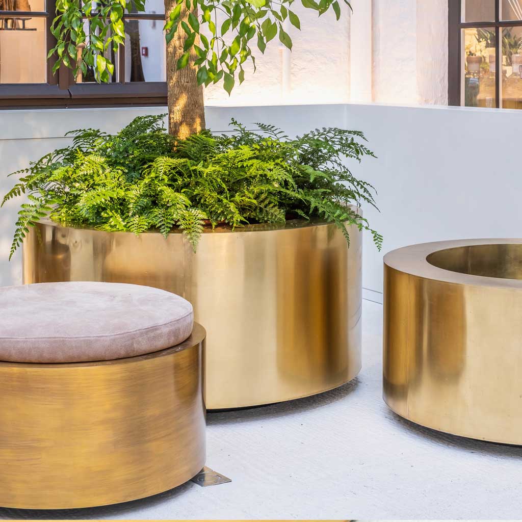 Image of 3 different sizes of Cuprum large modern round planters