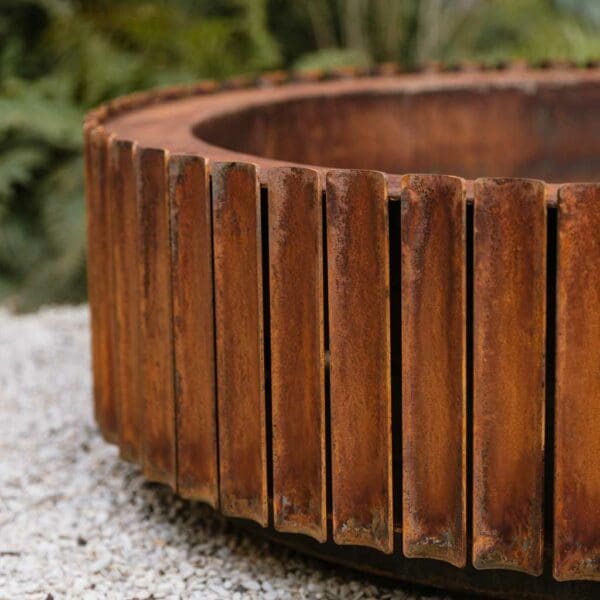 Image of detail of the corten steel slats around the radius of the Ring modern fire pit