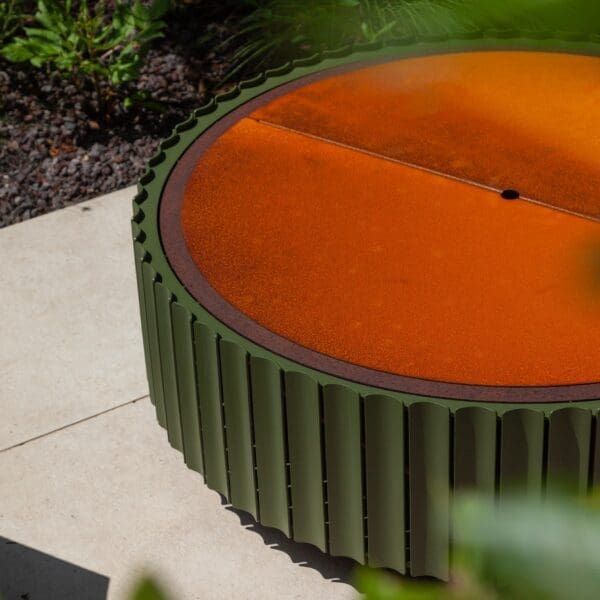 Image of Wunder The Ring fire pit in olive green steel with corten steel cover plate fitted