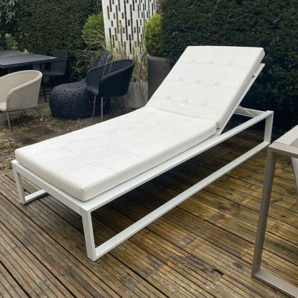 Image of Siesta minimalist white sun bed with buttoned stamskin fabric cushion