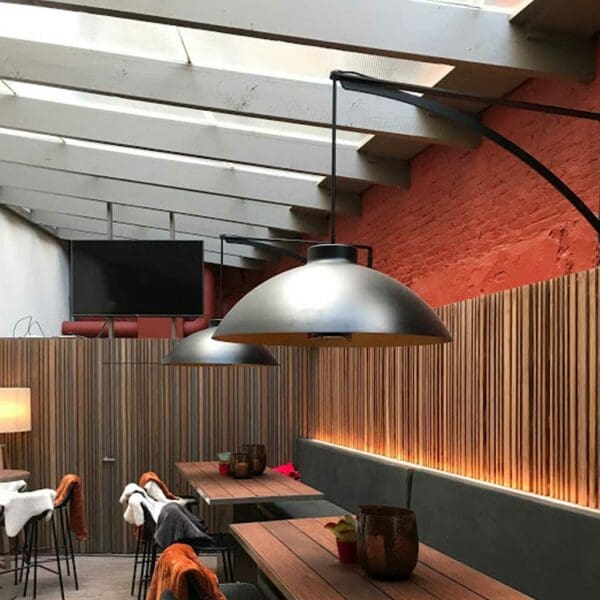 Image of pair of Heatsail Dome Wall Bracket heaters with dimmable light in a bar