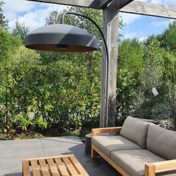 Image of Heatsail Disc electric terrace heater placed over teak garden sofas
