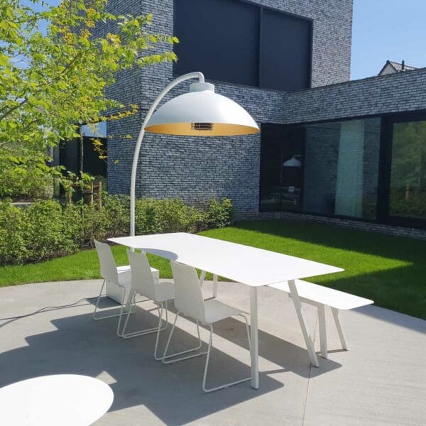 Image of white Dome electric garden heater by Heatsail above white Viteo Pure garden dining set, shown in sunny terrace