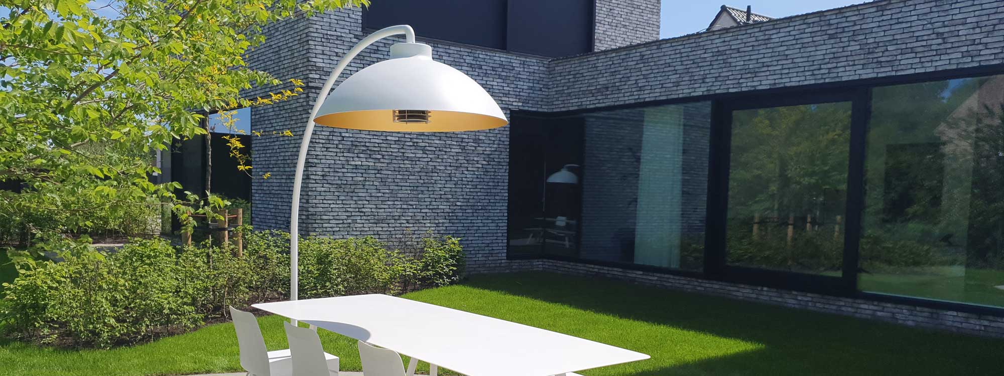 Image of white Dome patio heater by Heatsail above white garden dining furniture on sunny modern terrace