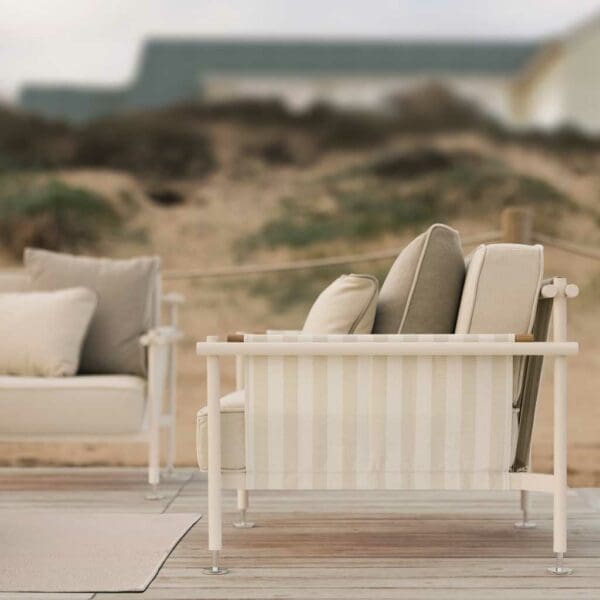 Image of Hamptons modern outdoor relax chair by Vondom, with sand dunes in the background