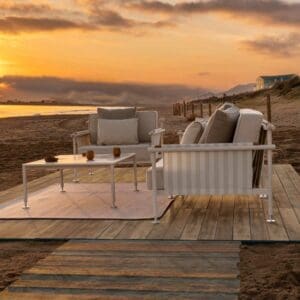 Image of Vondom Hamptons luxury sectional sofa on beach at dusk