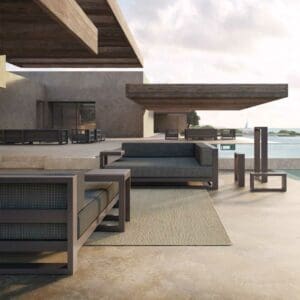 Image of anthracite coloured Posidonia contemporary lounge furniture by Vondom on a sleek minimalist terrace
