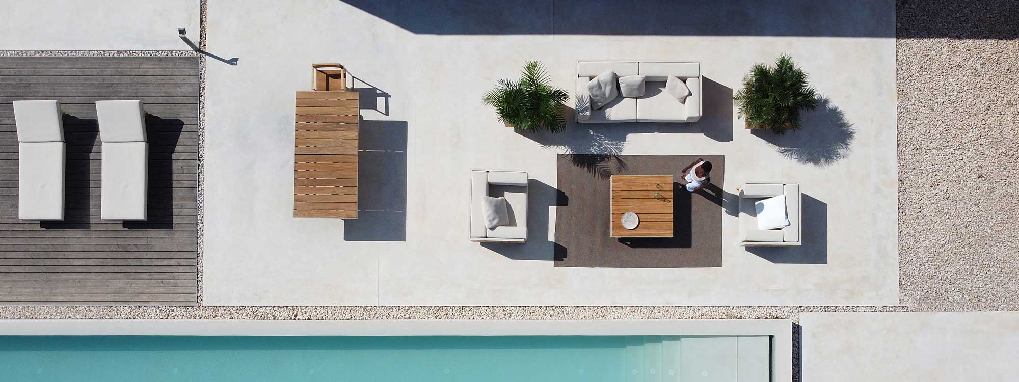 Image of bird's eye view of Vondom Vineyard modern outdoor furniture on sunny poolside