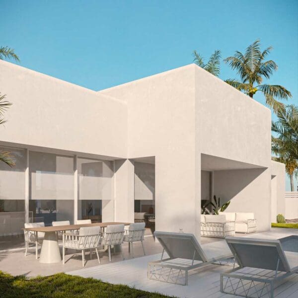 Image of white brutalist house with Ava modern garden furniture by Oiside in the foreground