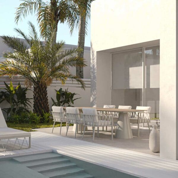 Image of Ava designer outdoor dining set by Oiside with palm tree in the background