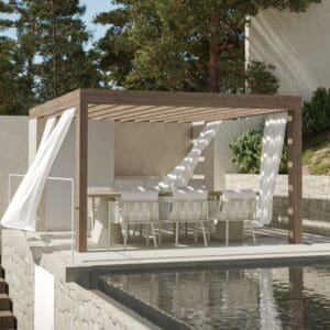 Image of Ava modern garden table and chairs by Oiside beneath a pergola with curtains being wafted by the breeze