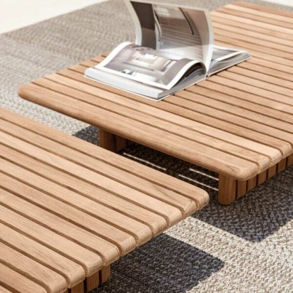 Image of planked teak tables from the Deck collection by Gloster garden furniture